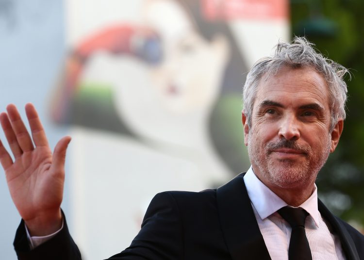 Director Alfonso Cuaron arrives for the premiere of the film "Roma" presented in competition on August 30, 2018 during the 75th Venice Film Festival at Venice Lido. / AFP PHOTO / Filippo MONTEFORTE
