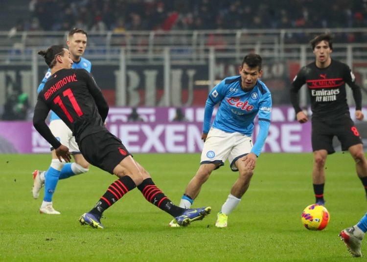 Milan (Italy), 19/12/2021.- AC Milan's forward Zlatan IbrahimoviC (L) in action against Napoli's forward Hirving Lozano (C) during the Italian Serie A soccer match AC Milan vs SSC Napoli at Giuseppe Meazza Stadium in Milan, Italy, 19 December 2021. (Italia) EFE/EPA/ROBERTO BREGANI