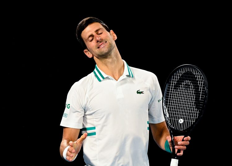 Melbourne (Australia).- (FILE) - Novak Djokovic of Serbia reacts during his Men's singles finals match against Daniil Medvedev of Russia on Day 14 of the Australian Open Grand Slam tennis tournament at Melbourne Park in Melbourne, Australia, 21 February 2021 (reissued 16 January 2022). Djokovic lost court appeal against deportation from Australia and will not be able to defend his Australian Open title in Melbourne. (Tenis, Abierto, Rusia) EFE/EPA/DEAN LEWINS AUSTRALIA AND NEW ZEALAND OUT *** Local Caption *** 56713583