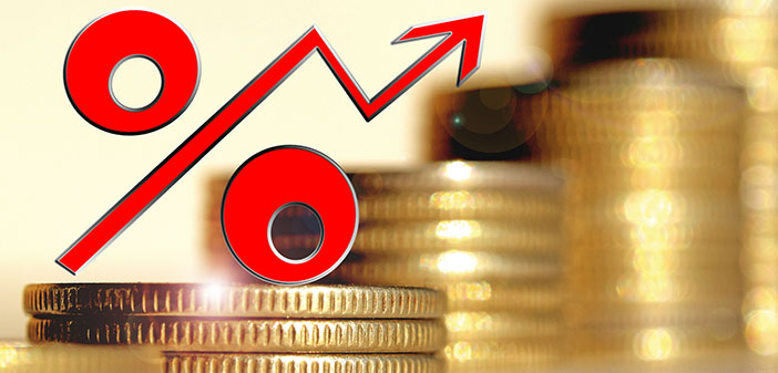 Red percent sign on a background of money . The concept of changes in Bank interest rates .