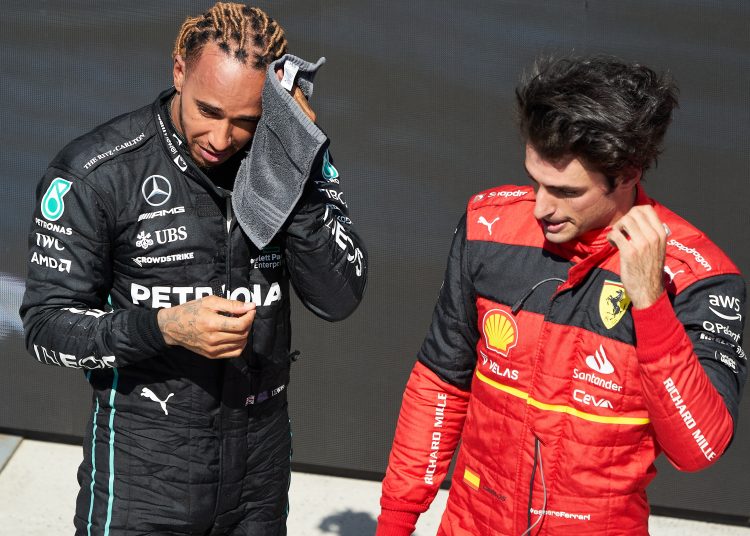Montreal (Canada), 19/06/2022.- Third placed British Formula One driver Lewis Hamilton of Mercedes-AMG Petronas (L) and second placed Spanish Formula One driver Carlos Sainz of Scuderia Ferrari after the Formula One Grand Prix of Canada at the Circuit Gilles-Villeneuve in Montreal, Canada, 19 June 2022. (Fórmula Uno) EFE/EPA/ANDRE PICHETTE
