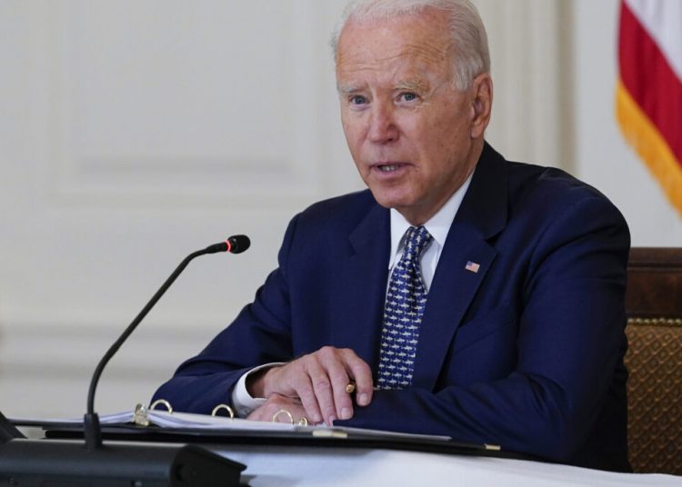 President Joe Biden speaks as he receives a briefing in the State Dining Room of the White House in Washington, Tuesday, Aug. 10, 2021, on how the COVID-19 pandemic is impacting hurricane preparedness. (AP Photo/Susan Walsh)