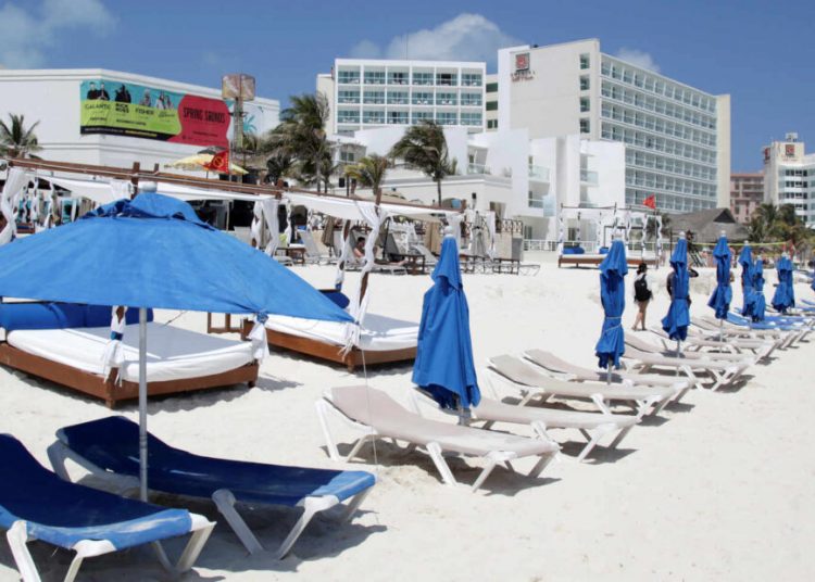 A general view shows empty sun chairs along a beach during the coronavirus disease (COVID-19) outbreak in Cancun, Mexico March 17, 2020. Picture taken March 17, 2020. REUTERS/Jorge Delgado