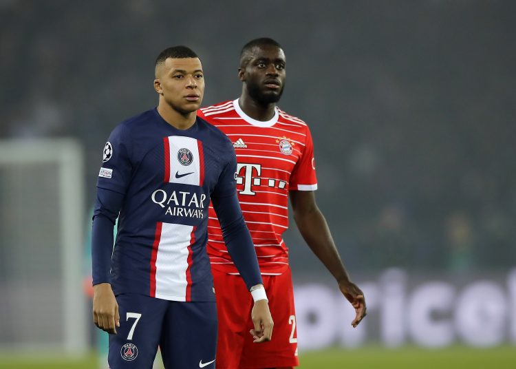 Paris (France), 14/02/2023.- Kylian Mbappe of PSG and Dayot Upamecano of Bayern Munich (R) look on during the UEFA Champions League Round of 16, 1st leg match between Paris Saint-Germain and Bayern Munich in Paris, France, 14 February 2023. (Liga de Campeones, Francia) EFE/EPA/TERESA SUAREZ