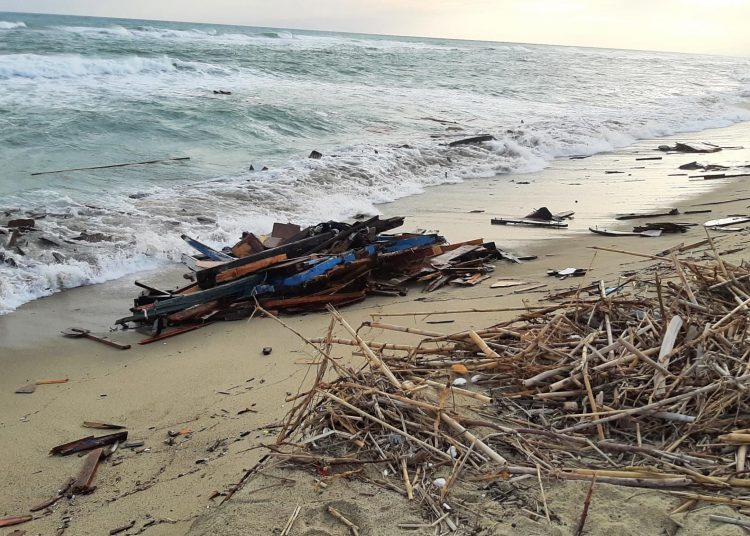 Cutro (Italy), 26/02/2023.- Debris wash ashore following a shipwreck, at a beach near Cutro, Crotone province, southern Italy, 26 February 2023. Italian authorities recovered at least 40 bodies on the beach and in the sea near Crotone, in the southern Italian region of Calabria, after a boat carrying migrants sank in rough seas near the coast, ANSA reported on 26 February. About forty people survived the accident, Italian firefighters added. Authorities fear the death toll will climb as rescuers look for survivors. (Incendio, Italia) EFE/EPA/ANSA