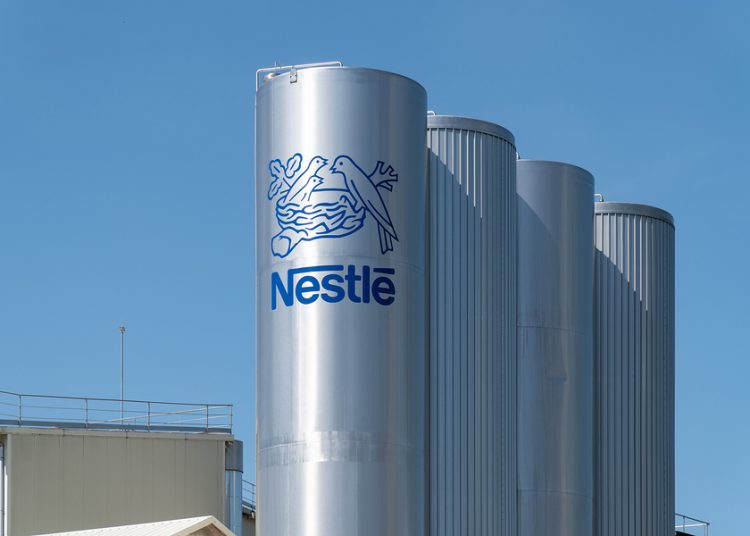 Pontecesures, Spain; june 16, 2019: Nestle logo on tank of Pontecesures factory