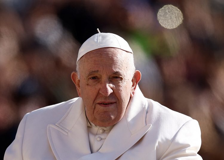 Pope Francis arrives for the weekly general audience in St. Peter's Square at the Vatican, March 29, 2023. REUTERS/Guglielmo Mangiapane