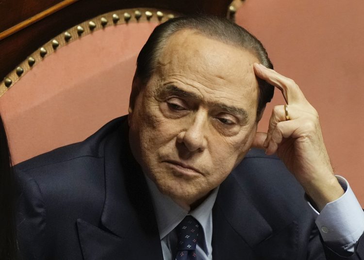 FILE - Forza Italia party leader Silvio Berlusconi at he Senate, in Rome, on Oct. 26, 2022. Former Italian Premier Silvio Berlusconi was hospitalized Wednesday, April 5, 2023, with apparent respiratory problems, Italian media reported. The 86-year-old three-time premier was in intensive care at Milan’s San Raffaele hospital, the clinic where he routinely receives care, LaPresse news agency, Sky TG24 and Corriere della Sera reported, without citing sources. (AP Photo/Andrew Medichini)