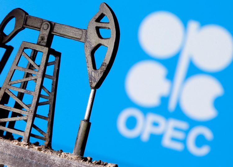 FILE PHOTO: A 3D-printed oil pump jack is seen in front of displayed OPEC logo in this illustration picture, April 14, 2020. REUTERS/Dado Ruvic/File Photo