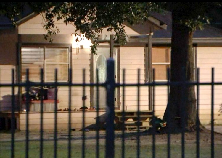 This image provided by KTRK shows the scene of a shooting early Saturday, April 29, 2023 in Cleveland, Texas. A man went next door with a rifle and began shooting his neighbors, killing several including an 8-year-old inside the house, after the family asked him to stop firing rounds in his yard because they were trying to sleep, authorities said Saturday.  (KTRK via AP)