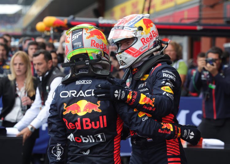Stavelot (Belgium), 30/07/2023.- First place winner Dutch Formula One driver Max Verstappen (R) of Red Bull Racing and his teammate second place winner Mexican Formula One driver Sergio Perez (L) celebrate after the 2023 Formula 1 Belgian Grand Prix at the Circuit de Spa-Francorchamps racetrack in Stavelot, Belgium, 30 July 2023. (Fórmula Uno, Bélgica) EFE/EPA/OLIVIER MATTHYS
