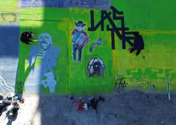 Activistas protestan contra violencia a migrantes con 70 murales en frontera México-Estados Unidos
