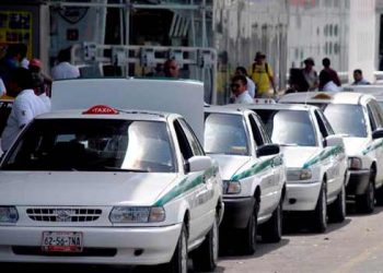 Uber y sindicato de taxistas de Cancún firman acuerdo de colaboración tras años de disputa