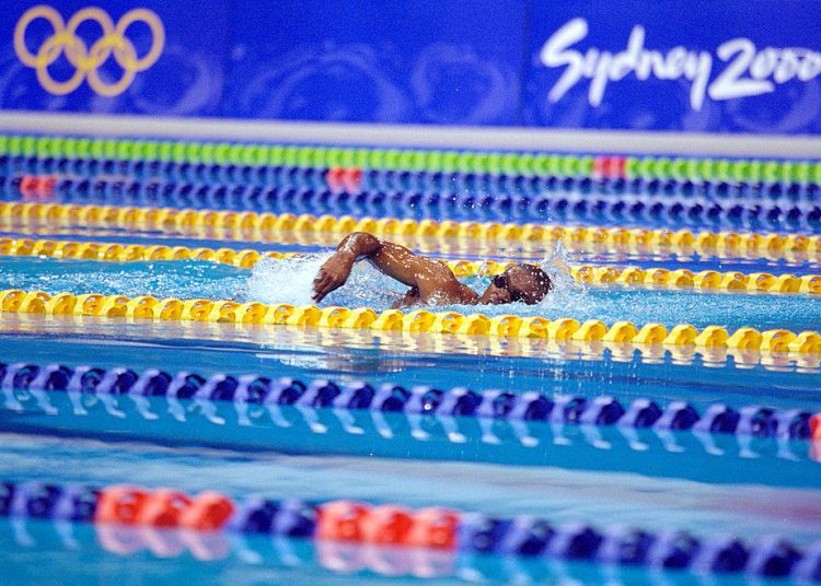 19 Sep 2000:  Eric Moussambani of Equatorial Guinea swims alone in his Men's 100m Freestyle Heat after his two opponents are both disqualified at the Sydney International Aquatic Centre on Day Four of the Sydney 2000 Olympic Games in Sydney, Australia. Mandatory Credit: Mike Powell /Allsport