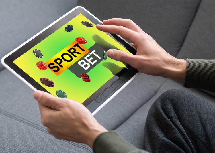 Gambling online casino Internet betting concept green screen. smartphone with poker chips, dice. Jackpot, casino chips. High quality photo
