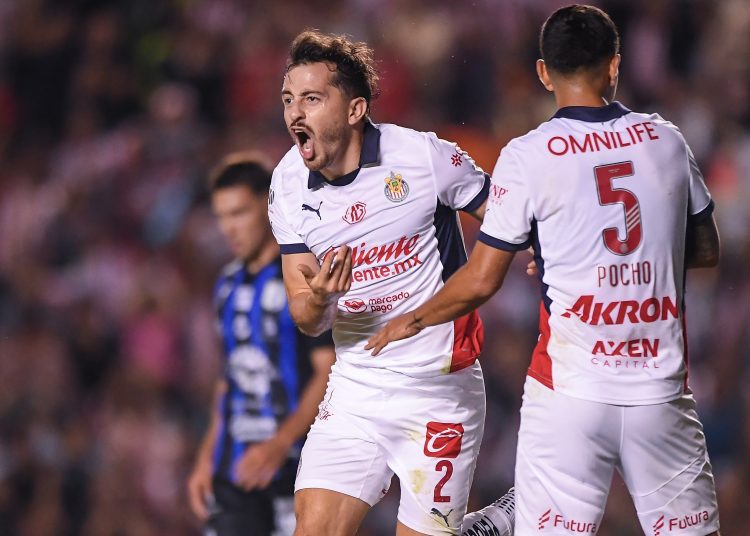 Alan Mozo celebrates his goal 0-2 of Guadalajara during the 3rd round match between Queretaro and Guadalajara as part of the Liga BBVA MX, Torneo Apertura 2024 at La Corregidora Stadium on July 16, 2024 in Santiago de Queretaro, Mexico.