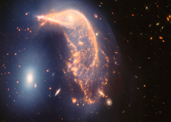 Nueva foto del telescopio Webb muestra dos galaxias “danzando”, en su segundo aniversario