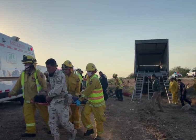 trailer con migrantes