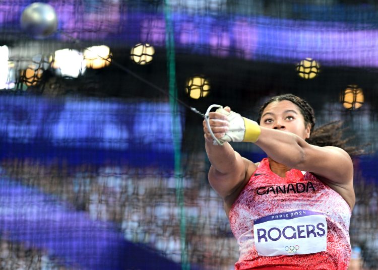 Saint-denis (France), 06/08/2024.- Camryn Rogers of Canada competes in the Women Hammer Throw final of the Athletics competitions in the Paris 2024 Olympic Games, at the Stade de France stadium in Saint Denis, France, 06 August 2024. (Lanzamiento de martillo, Francia) EFE/EPA/CHRISTIAN BRUNA