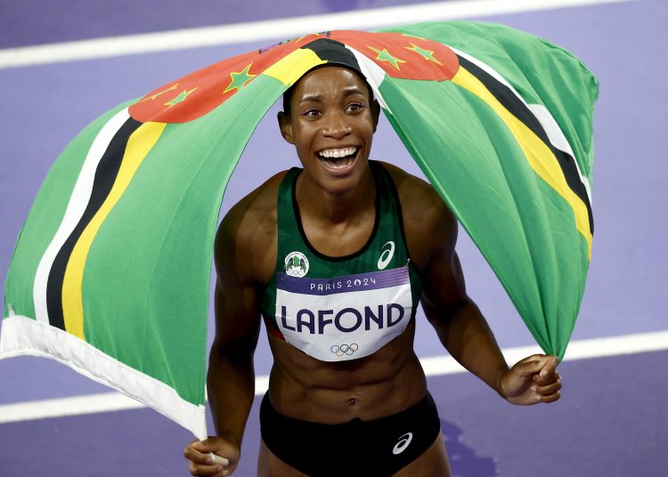 Saint-denis (France), 03/08/2024.- Thea Lafond of Dominica celebrates after winning the Women Triple Jump final of the Athletics competitions in the Paris 2024 Olympic Games, at the Stade de France stadium in Saint Denis, France, 03 August 2024. (Triple salto, Francia) EFE/EPA/YOAN VALAT