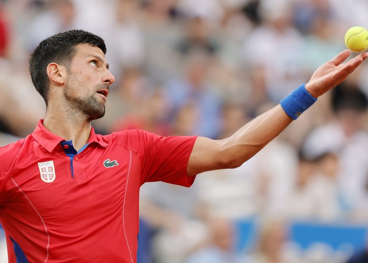 Paris (France), 01/08/2024.- Novak Djokovic of Serbia in action against Stefanos Tsitsipas of Greece (unseen) during their Men's Singles quarterfinal match of the tennis competitions in the Paris 2024 Olympic Games, at the Roland Garros in Paris, France, 01 August 2024. (Tenis, Francia, Grecia) EFE/EPA/RONALD WITTEK