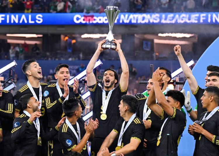 Raul Jimenez of Mexico lifts the champions trophy with Players during the Final match between Mexican National Team (Mexico) and Panama as part Final Four of the Concacaf Nations League 2024-2025 at SoFi Stadium on March 23, 2025 in Inglewood, Los Angeles, California, United States.