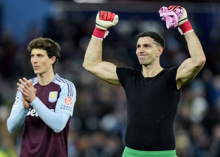 BIRMINGHAM (United Kingdom), 12/03/2025.- Pau Torres (L) and goalkeeper Emiliano Martinez (R) of Aston Villa celebrate with their supporters after winning the UEFA Champions League Round of 16, 2nd leg soccer match between Aston Villa and Club Brugge KV, in Birmingham, Britain, 12 March 2025. (Liga de Campeones, Reino Unido) EFE/EPA/TIM KEETON