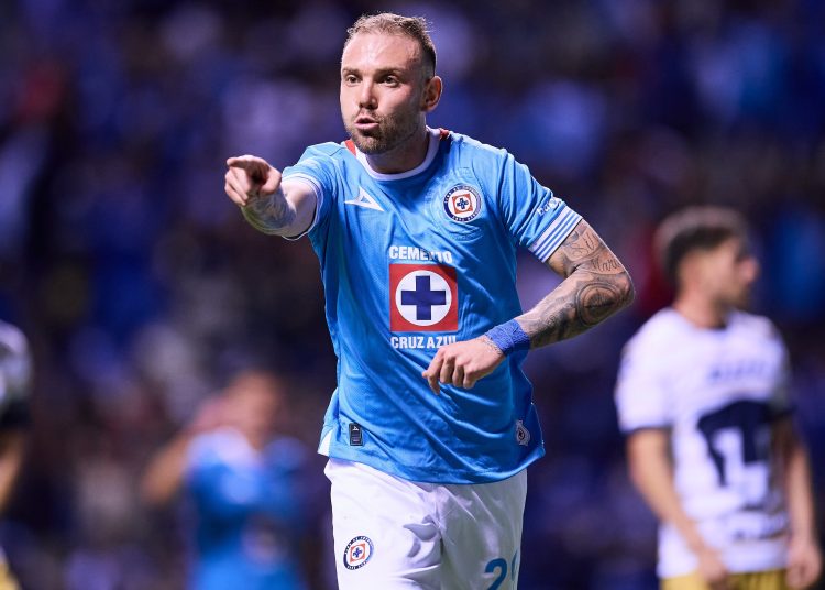 Carlos Rotondi celebrates his goal 3-1 of cruz Azul during the 14th round match between Cruz Azul and Pumas UNAM as part of the Liga BBVA MX, Torneo Clausura 2025 at Cuauhtemoc Stadium, on April 05, 2025 in Puebla, Mexico.
