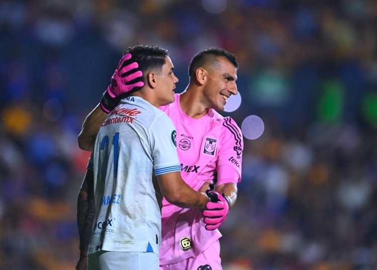 Gabriel Fernandez of Cruz Azul and Nahuel Guzman of Tigres during the Semi-Finals first leg match between Tigres UANL and Cruz Azul as part of the CONCACAF Champions Cup 2025, at Universitario Stadium on April 23, 2025 in Monterrey, Nuevo Leon, Mexico.