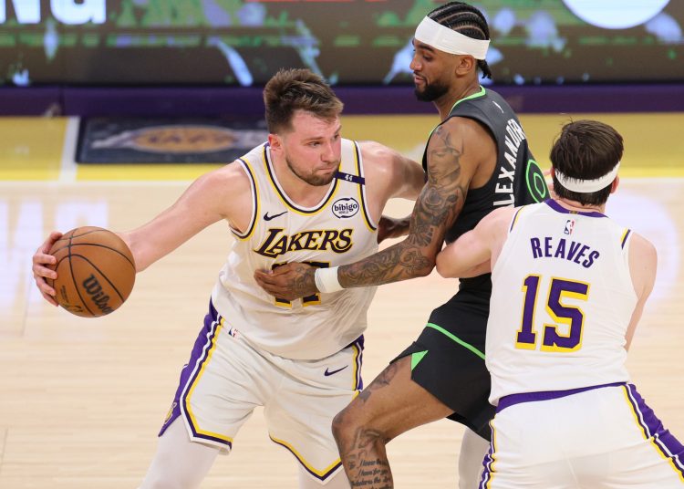 LOS ANGELES (United States), 20/04/2025.- Los Angeles Lakers Luka Doncic (L) looks to drive the ball down the court during the first half of the NBA playoffs round one game one between the Minnesota Timberwolves and the Los Angeles Lakers in Los Angeles, California, 19 April 2024. (Baloncesto) EFE/EPA/ALLISON DINNER SHUTTERSTOCK OUT