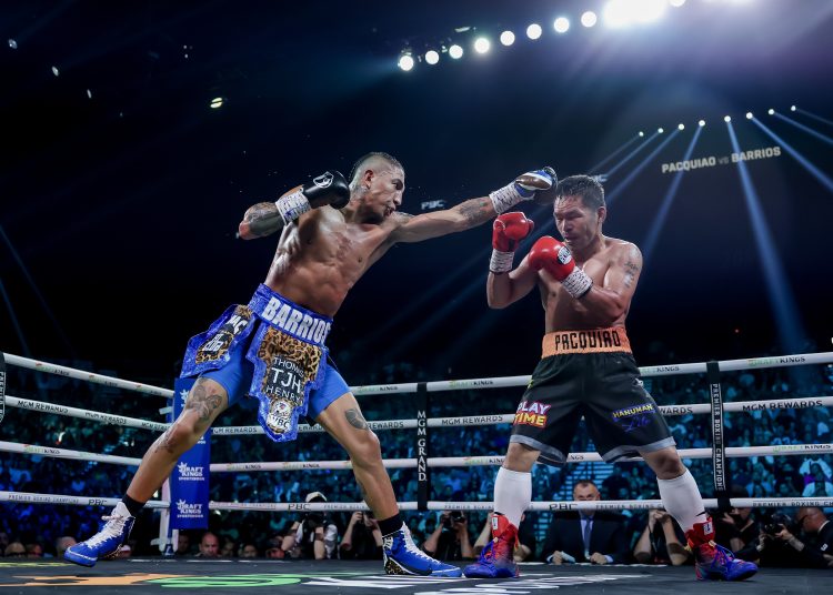 Las Vegas (United States), 20/07/2025.- Manny Pacquiao (R) of the Philippines in action against Mario Barrios (L) of the USA during their WBC Welterweight Championship bout at the MGM Grand Garden Arena in Las Vegas, Nevada, USA, 19 July 2025. (Filipinas) EFE/EPA/ALLISON DINNER