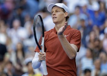 Jannik Sinner of Italy celebrates winning against Denis Shapovalov