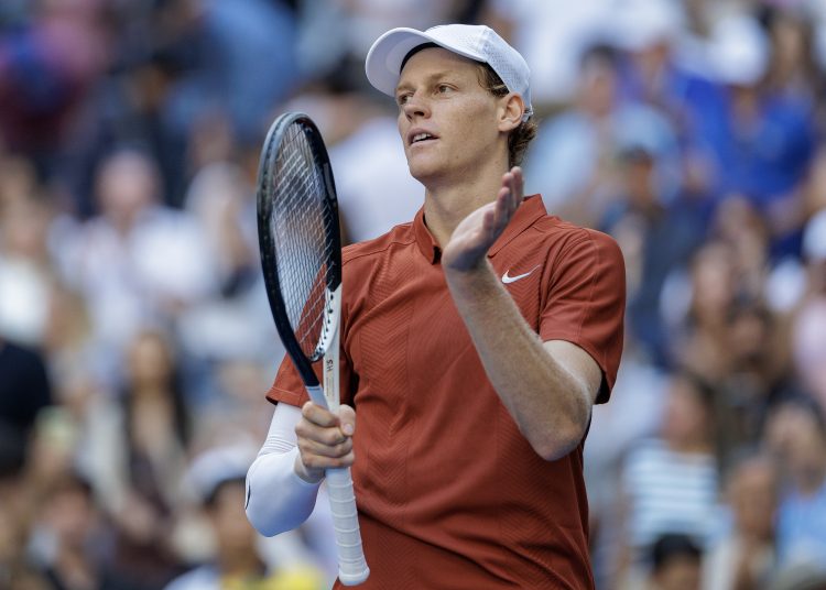 Jannik Sinner of Italy celebrates winning against Denis Shapovalov