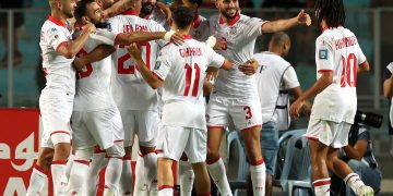 Players of Túnez celebrate scoring a goal during the FIFA World Cup 2026 qualification