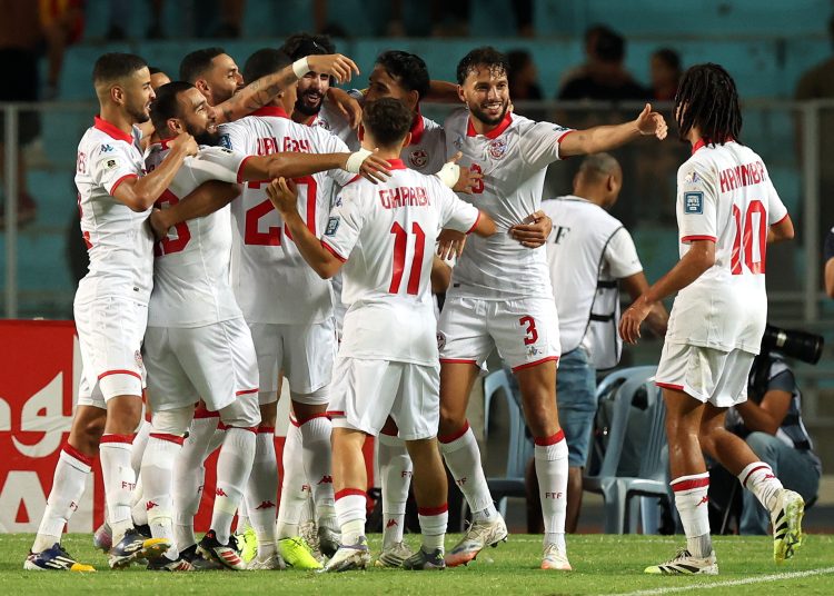 Players of Túnez celebrate scoring a goal during the FIFA World Cup 2026 qualification