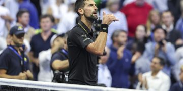 Novak Djokovic of Serbia reacts to winning his match