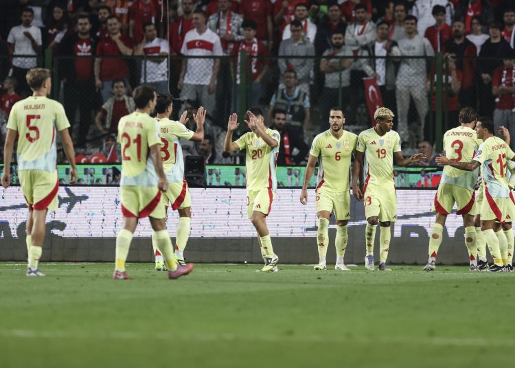 Players of España celebrate after scoring the 0-4 goal during the FIFA World Cup 2026