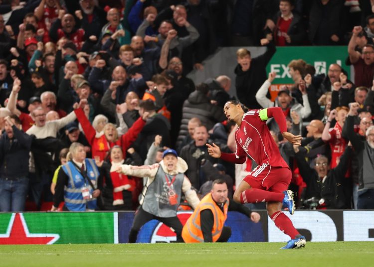 Liverpool Virgil van Dijk celebrates after scoring the 3-2 during the UEFA