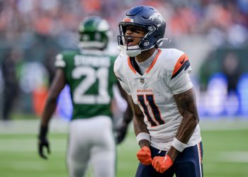 Denver Broncos wide receiver Troy Franklin (R) reacts