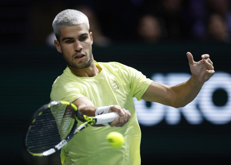 Carlos Alcaraz of Spain in action during his second round match against Cameron Norrie