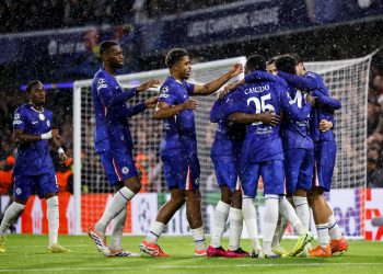 Players of Chelsea celebrate scoring the 4-1 goal from penalty during