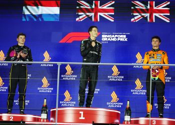 First place Mercedes driver George Russell (C) of Britain, second place Red Bull Racing