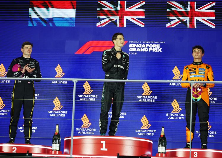 First place Mercedes driver George Russell (C) of Britain, second place Red Bull Racing