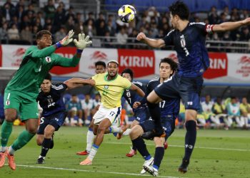 Brazil’s Joelinton (C) competes for the ball during the international friendly soccer match between Japon