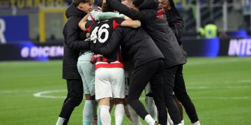 Mlan’s players celebrate after winning the Italian Serie A soccer match between Inter and Milan