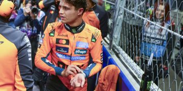 McLaren driver Lando Norris of Britain reacts on the grid prior