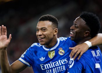 Real Madrid Kylian Mbappe (L) celebrates after scoring a goal during the UEFA Champions League