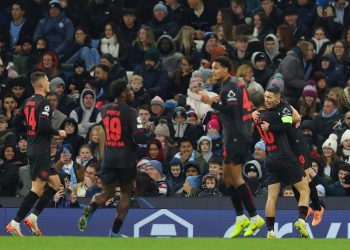 Leverkusen Alejandro Grimaldo (R) celebrates with teammates after s