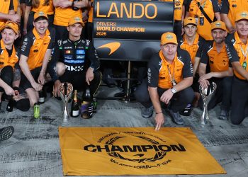 McLaren driver Lando Norris (C-L) of Britain poses with McLaren Racing CEO Zak Brown