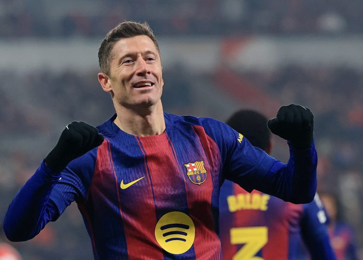 Barcelona's Robert Lewandowski celebrates scoring the 2-4 goal during the UEFA Champions League